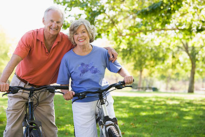 a person standing next to a bicycle